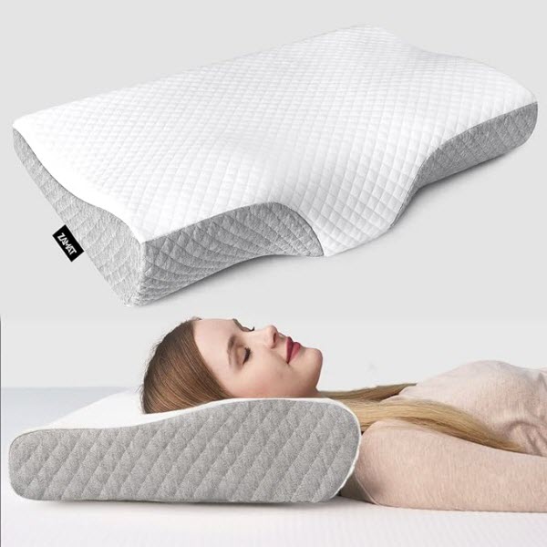 The ZAMAT Contour Memory Foam Pillow provides health benefits through its ergonomic design, supporting the head, neck, and shoulders for reduced pain and enhanced relaxation. It ensures hygiene with its adjustable and washable cover.